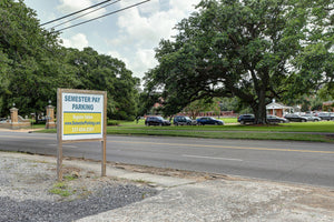 Parking lot spots at 117 East University avenue for UL Lafayette campus street view